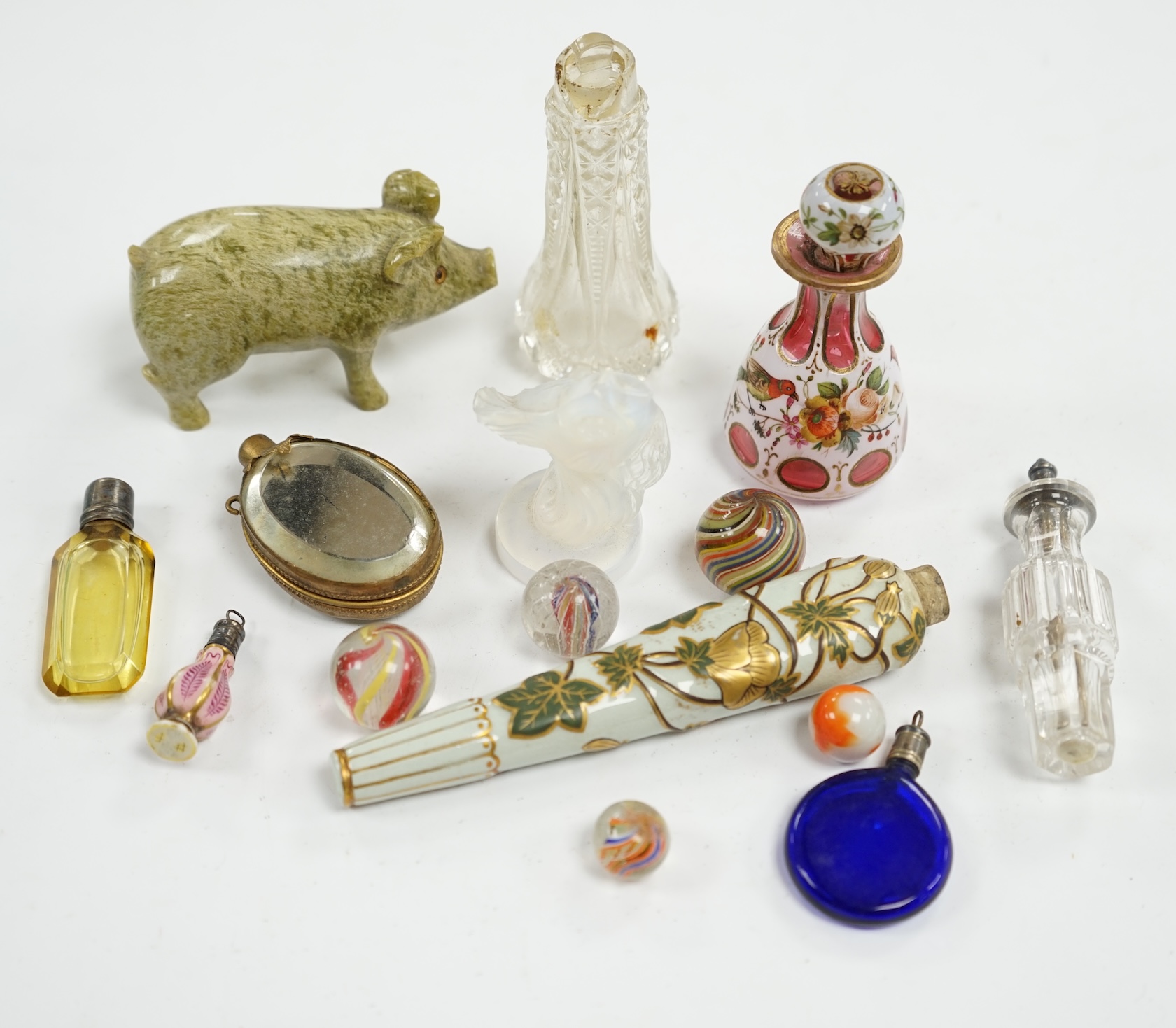 Miscellaneous Victorian scent bottles, a novelty miniature glass chamberpot, a Sabino-type opalescent glass fish model, etc, largest 12.5cm in length. Condition - mostly poor to fair